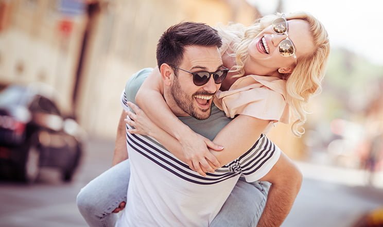 couple joying a day out enjoying their smile makeover